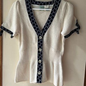 Cap sleeve buttoned knit top, brand new, in the original plastic bag, size L.